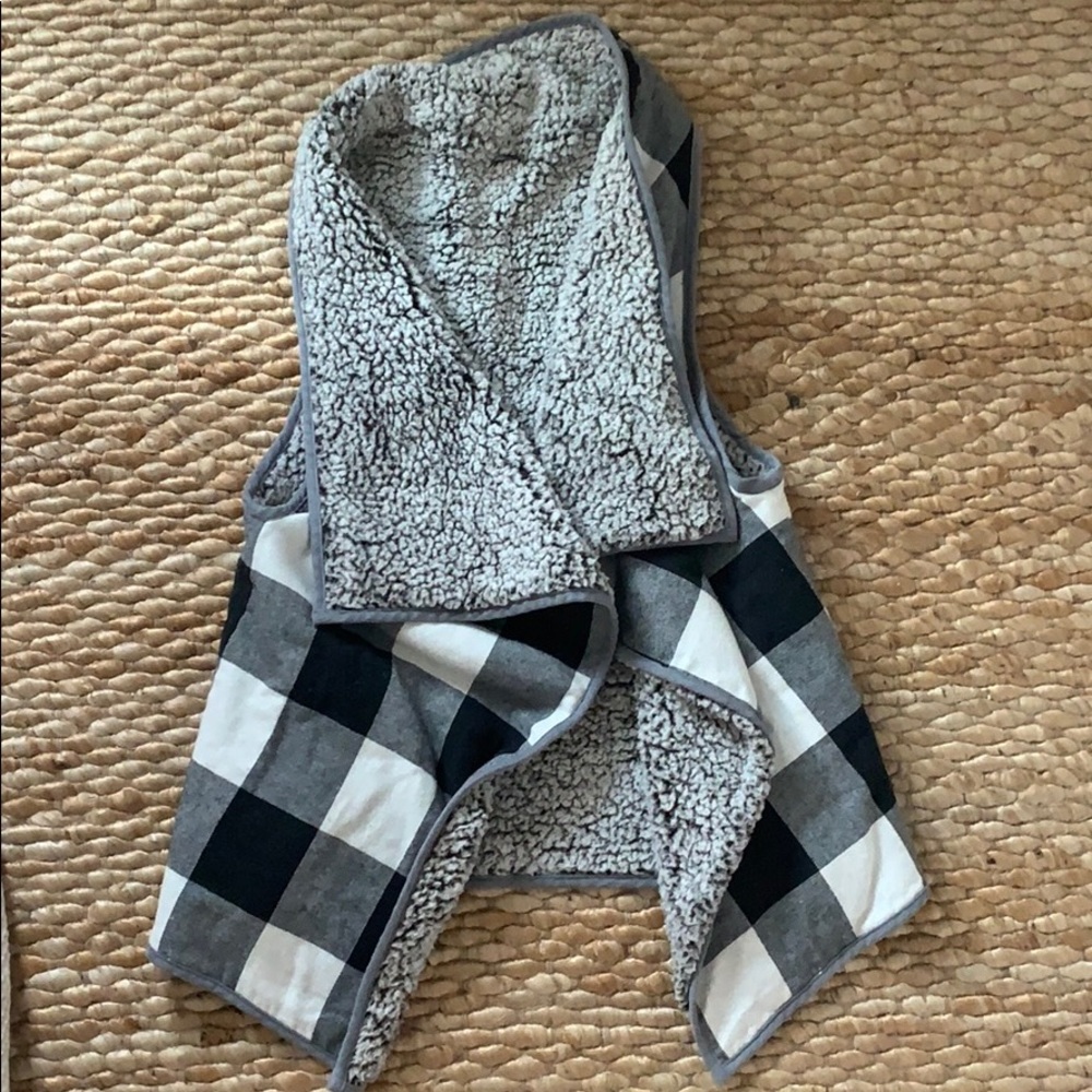 Reversible pocketed sherpa vest